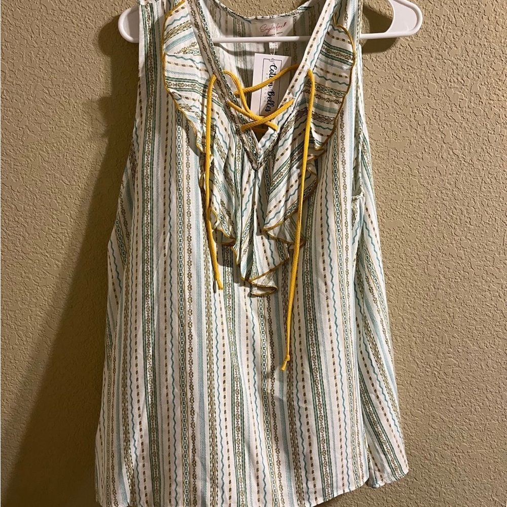NWT sleeveless blouse with ruffles